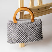 شنطه رصاصية بمقبض خشب