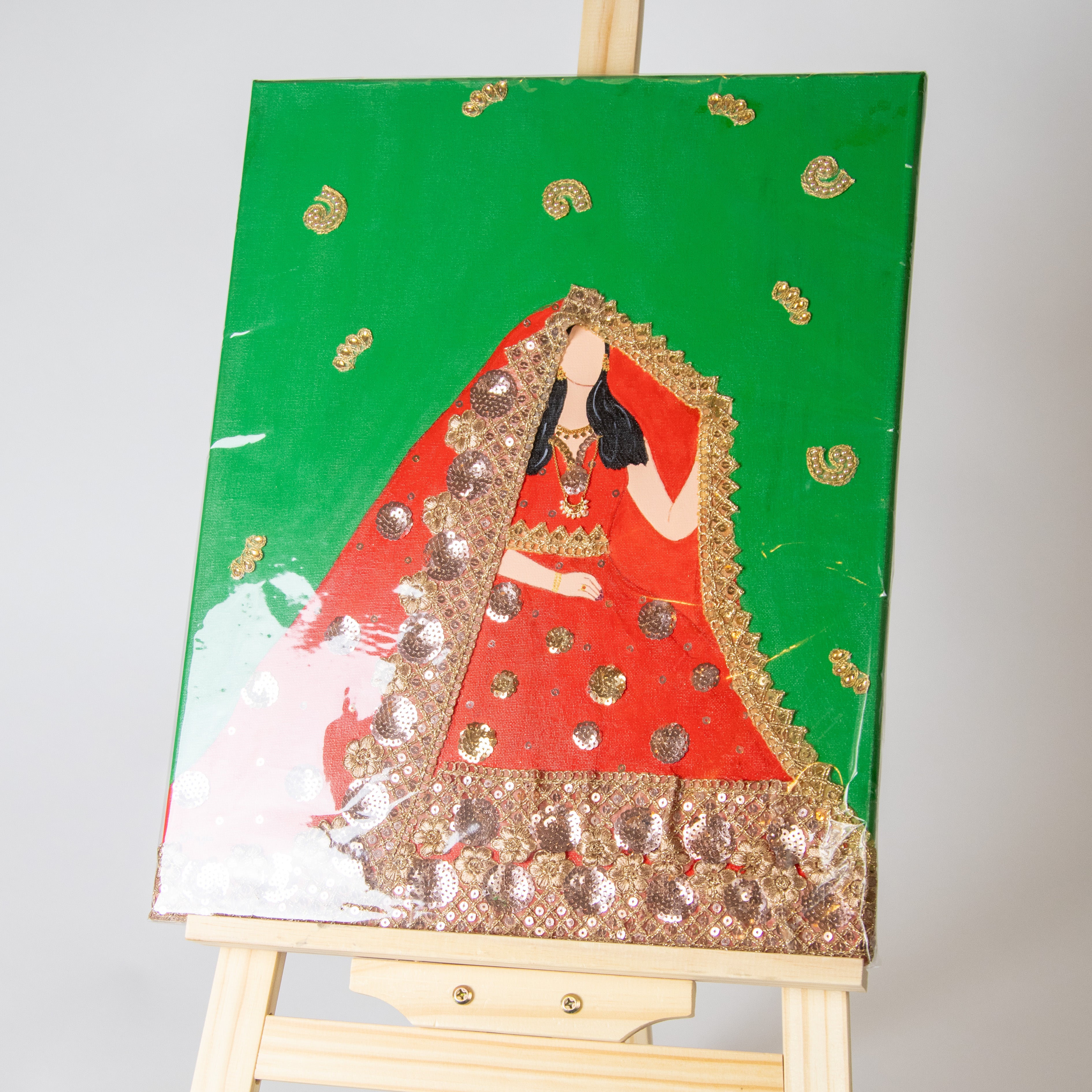 لوحة تراثية بالثوب الأحمر