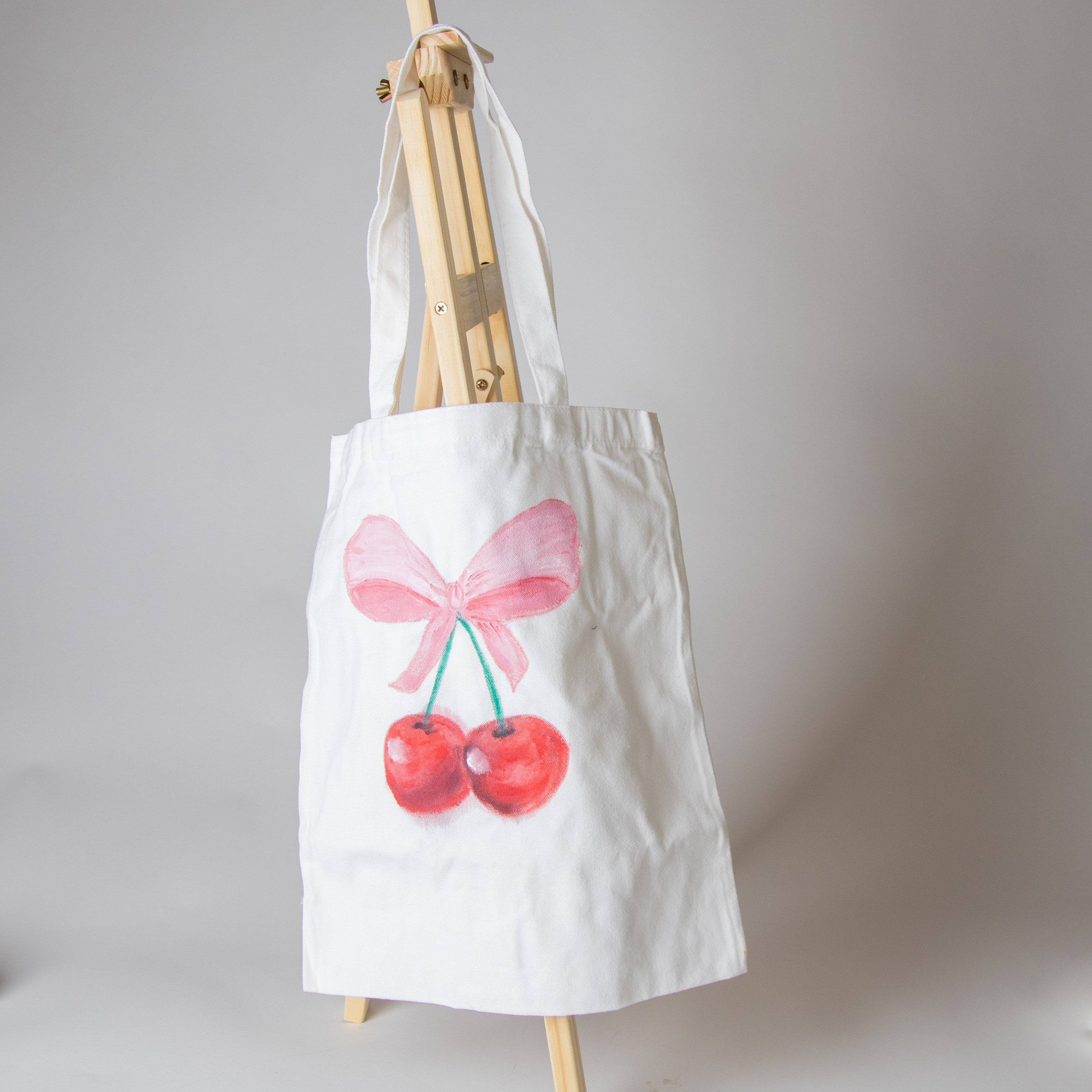 شنطه قماشيه برسم يدوي