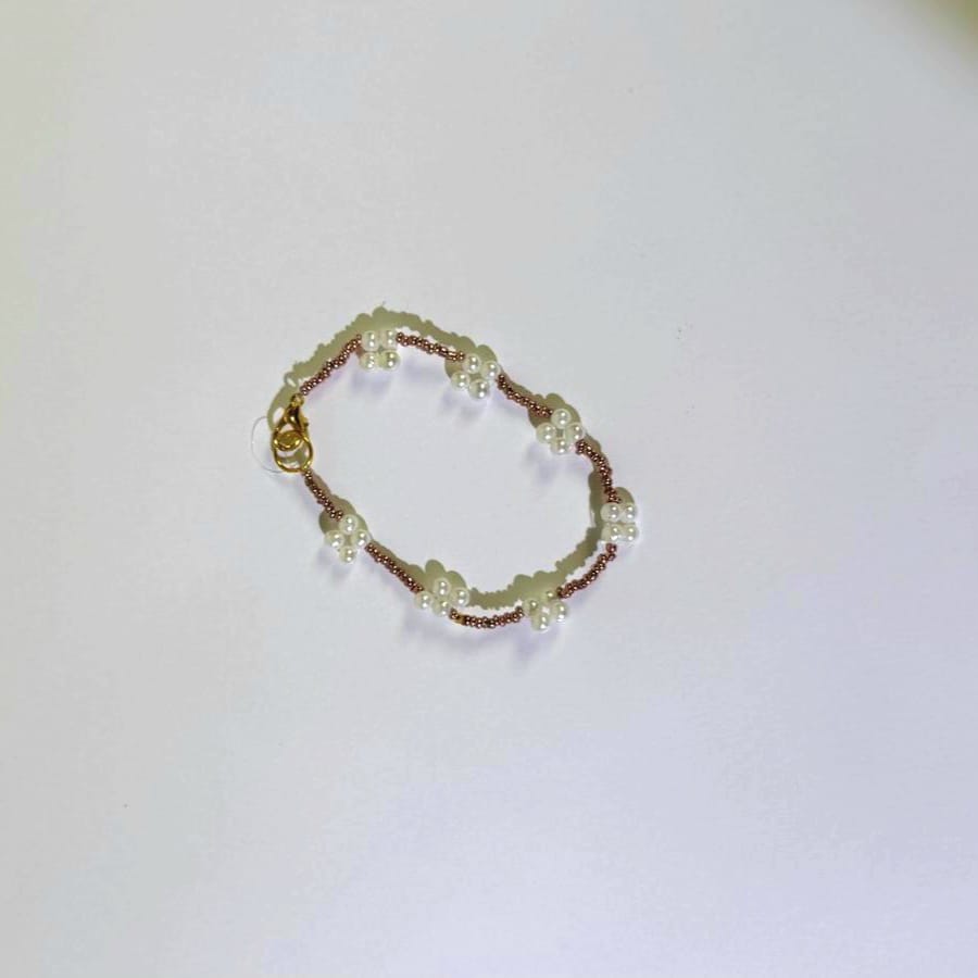 سِوار لؤلؤ ونحاسي