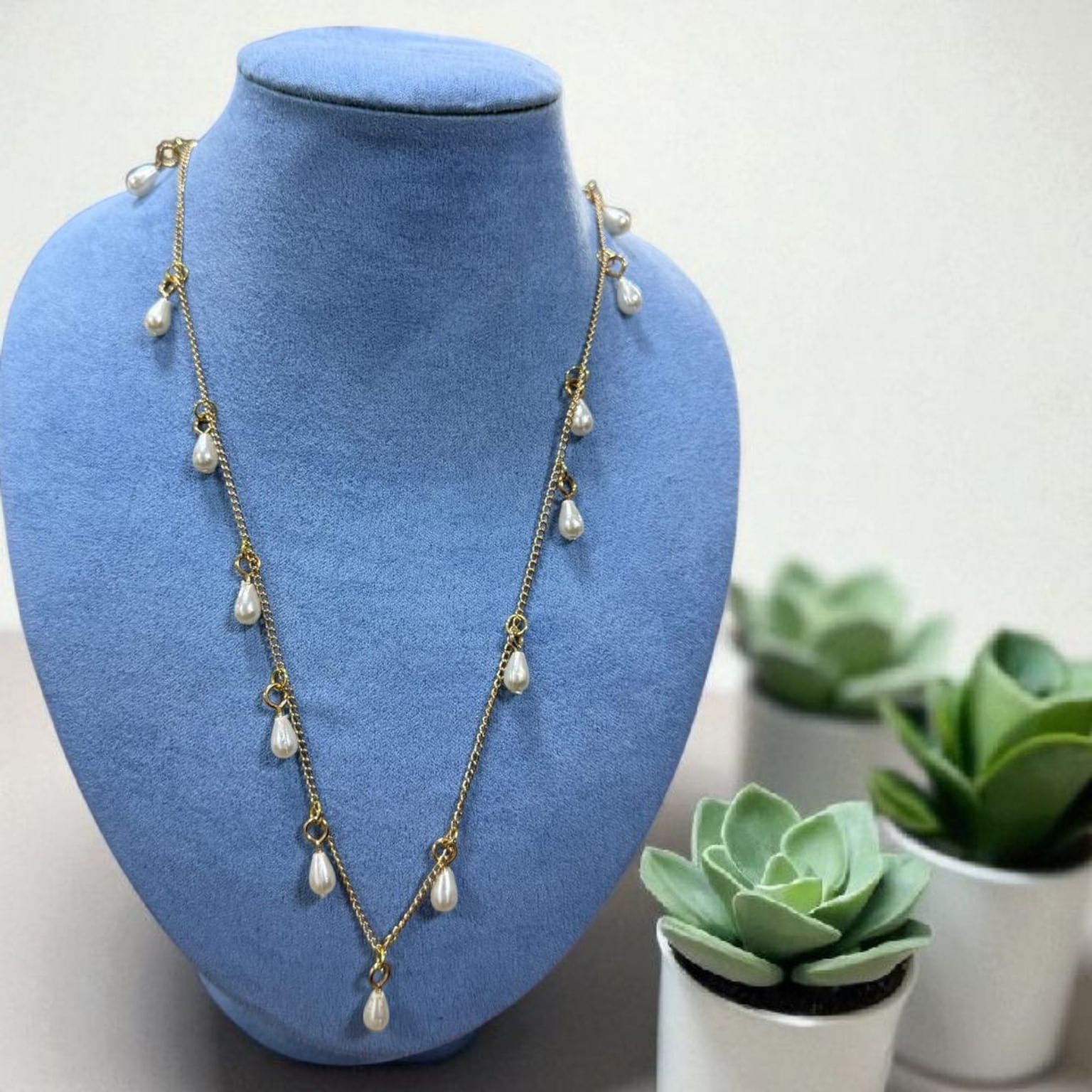 عقد طويل لؤلؤي