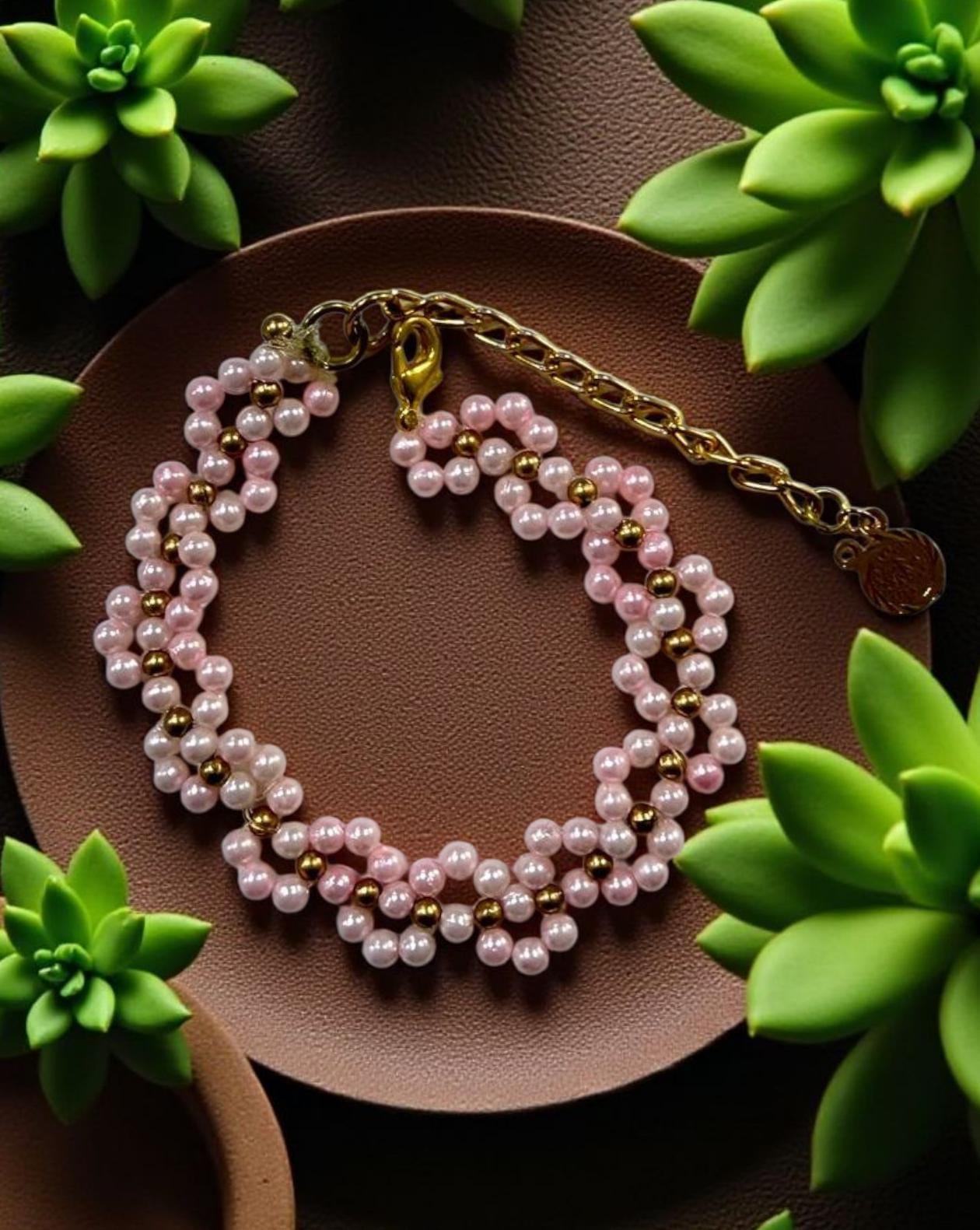 سِوار لؤلؤ زهري وذهبي