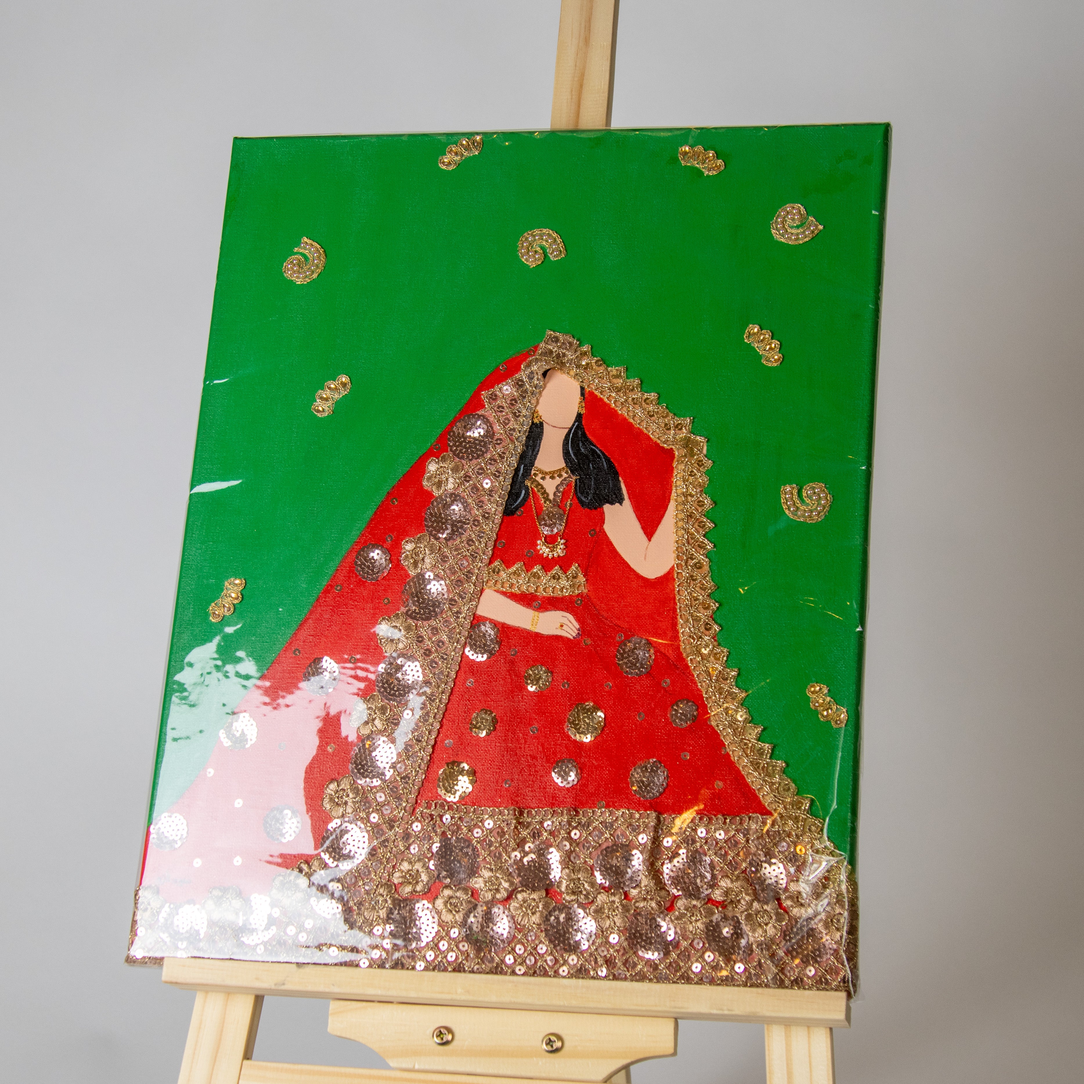 لوحة تراثية بالثوب الأحمر