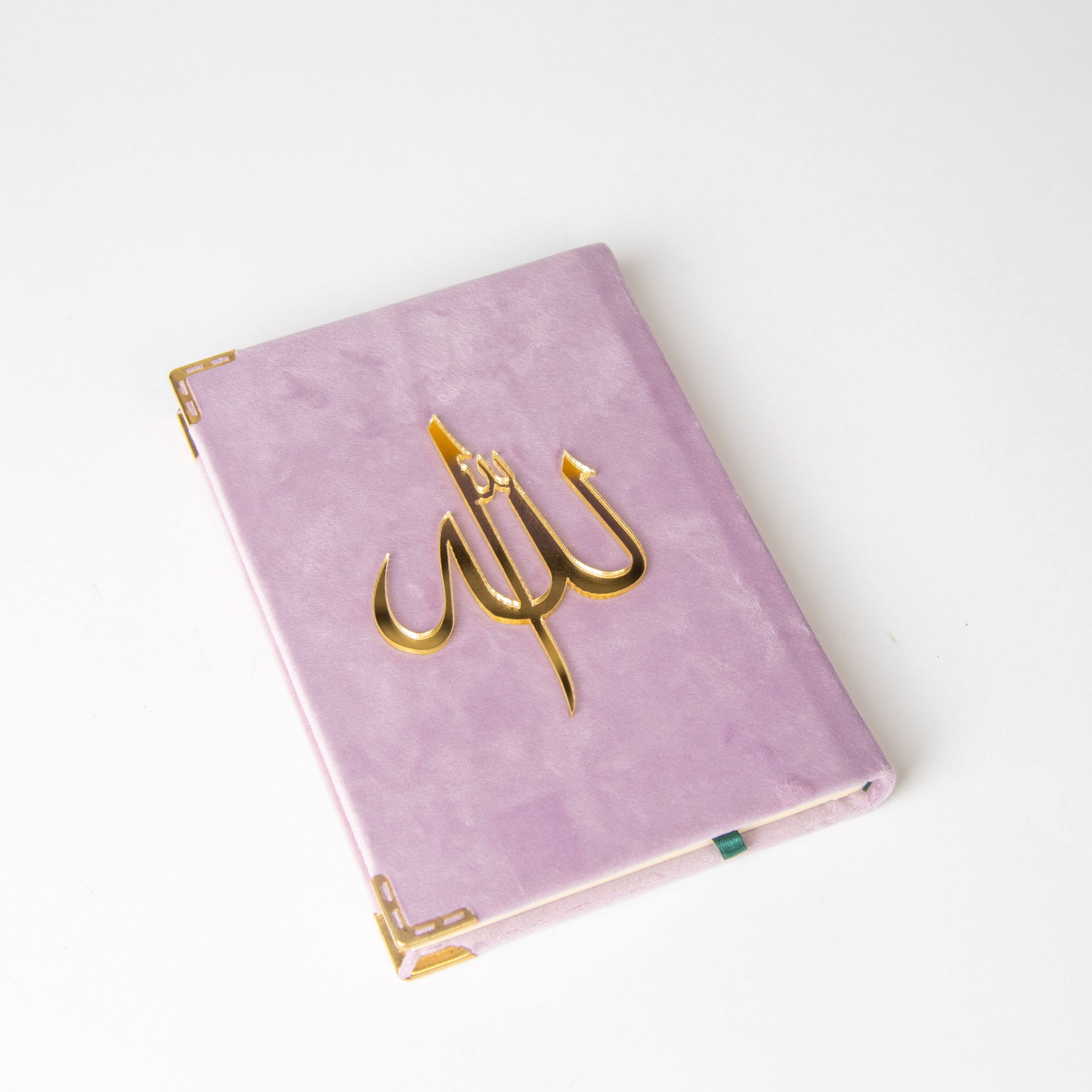 قرآن مغلف بنفجسي